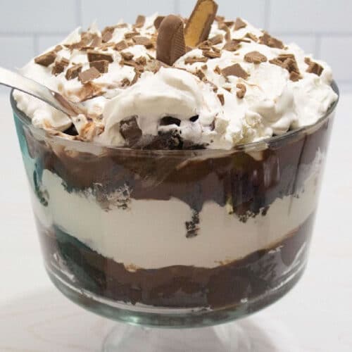 closeup of a chocolate trifle made using easter leftover candy with a spoon scooping some out