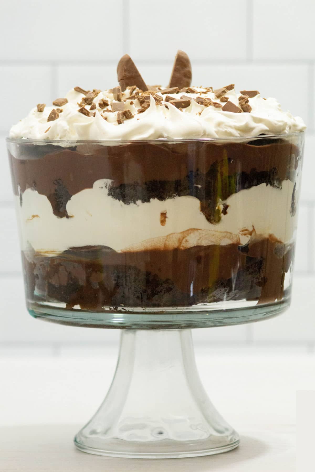 layers of brownie, chocolate pudding and leftover easter candy in a delicious trifle