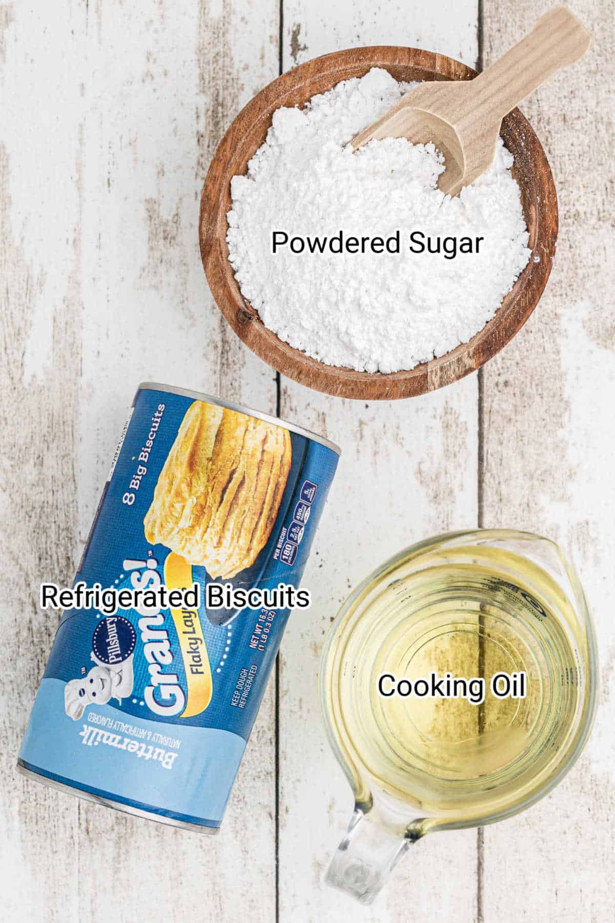 ingredients for biscuit beignets - refrigerated biscuits, powdered sugar and cooking oil