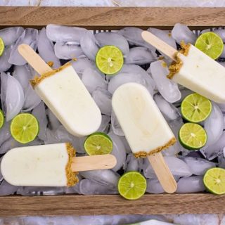 tray of ice with key limes and popsicles on it