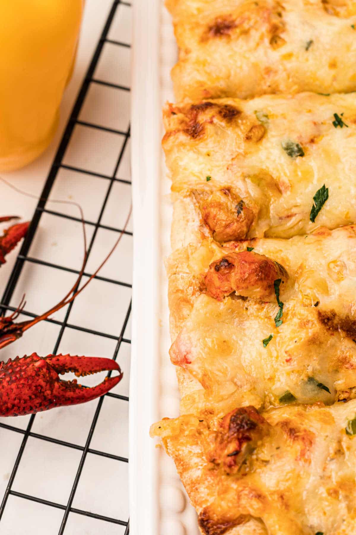 a close up of a loaf of crawfish bread