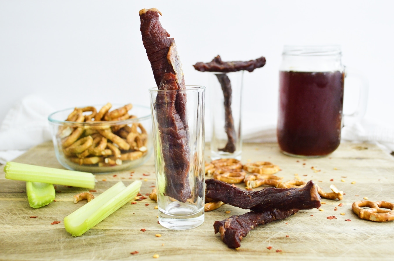 tall glasses with sticks of venison jerky standing