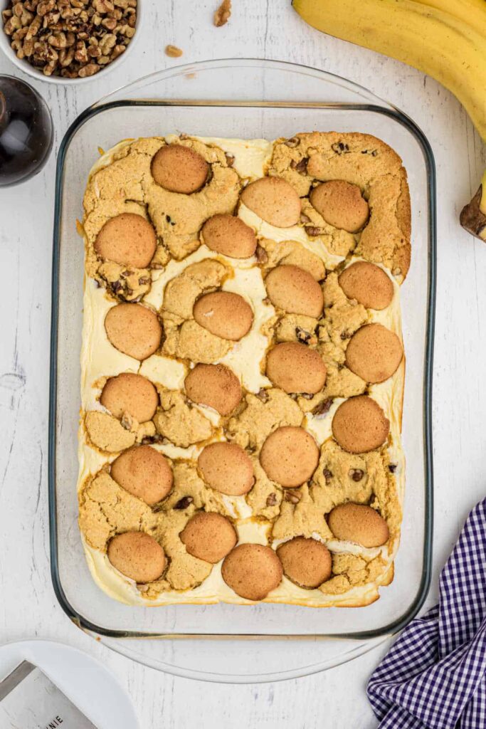 big dish of banana pudding brownies with vanilla wafers on top