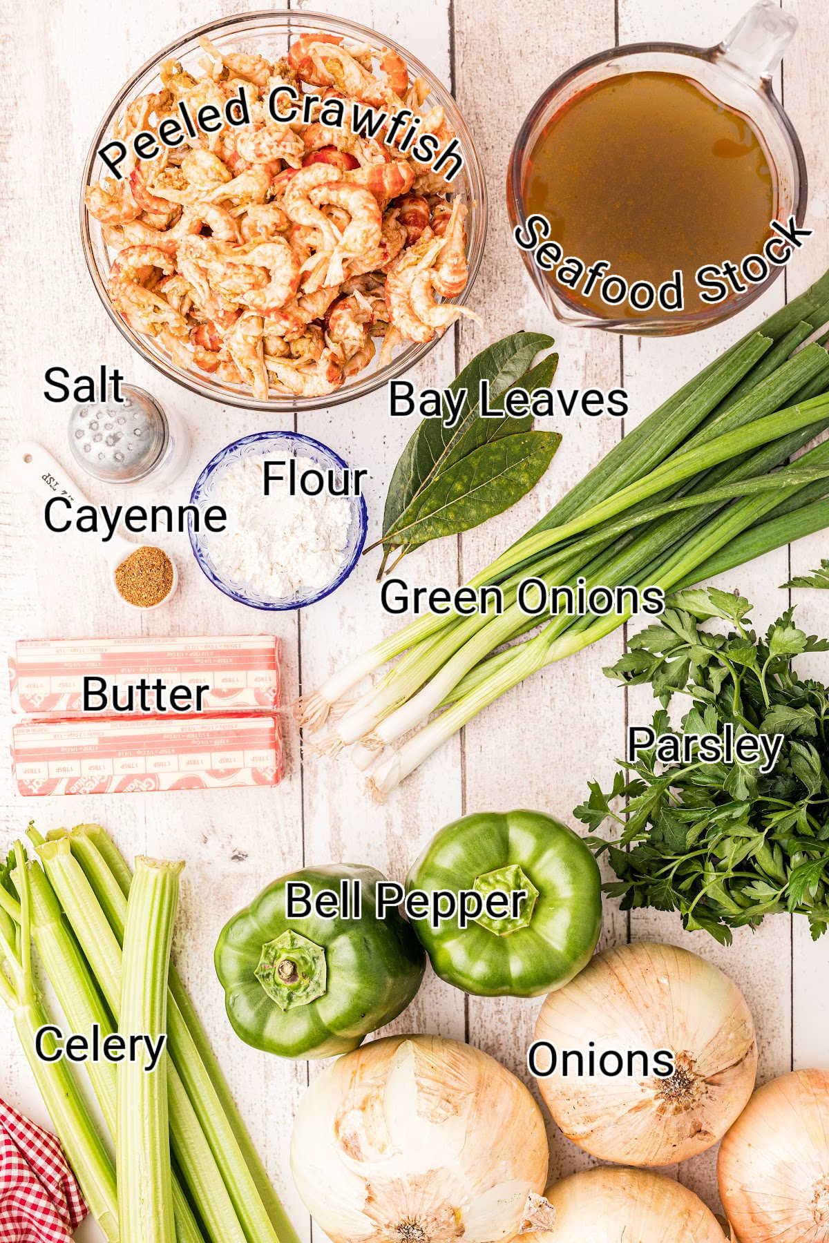 a layout of all the ingredients needed in a crawfish etouffee