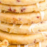 cranberry orange shortbread cookie closeup of them stacked up