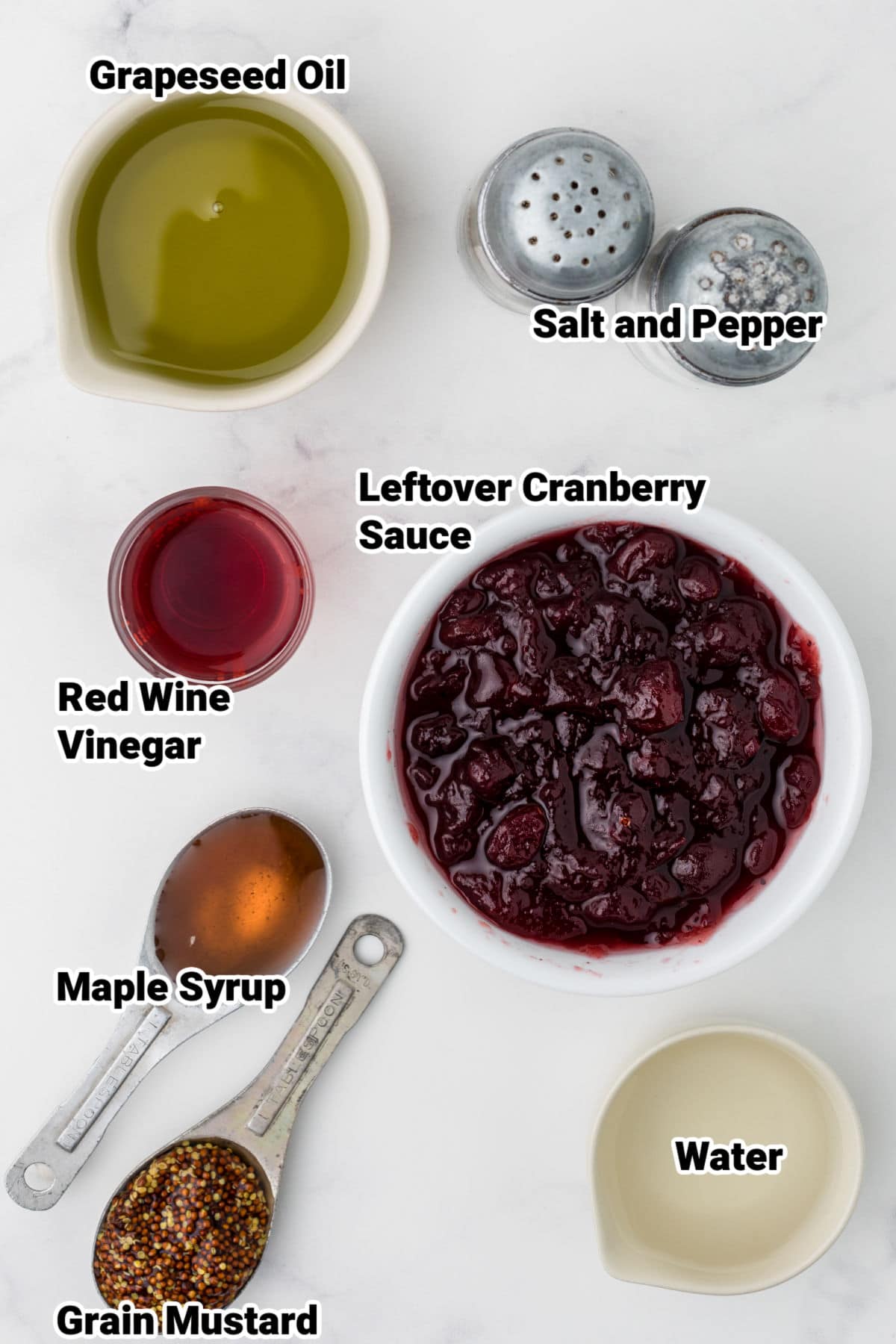 ingredients laid out for a cranberry vinaigrette