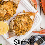 close up of a stuffed crab with some boiled crabs on the outside