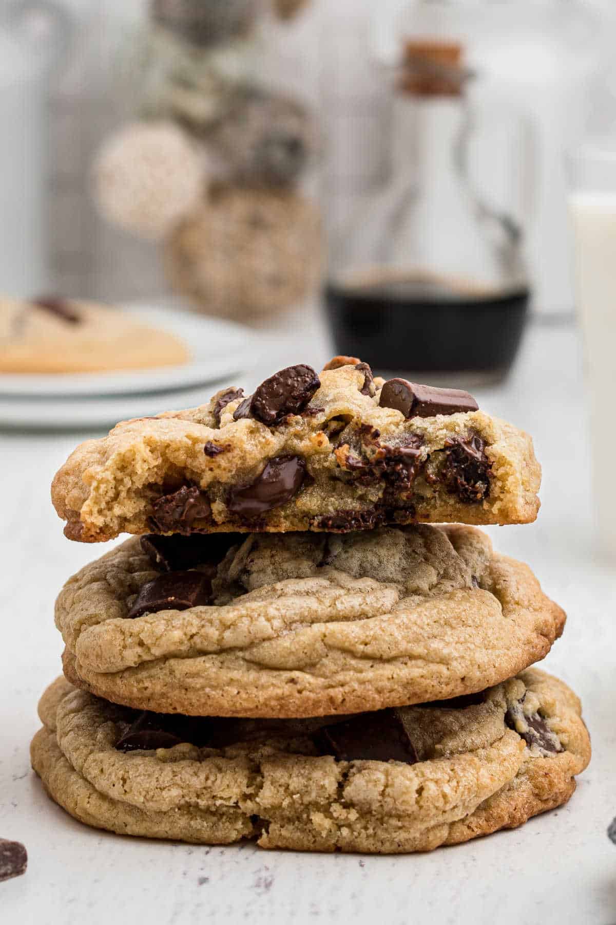 a stack of chunky chocolate chip cookies