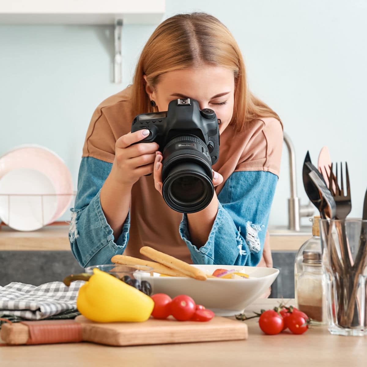a girl photographing food