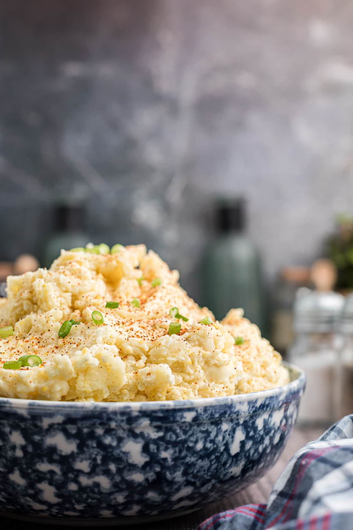 a side view of a bowl of Cajun Potato Salad