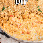 close up image of cheesy crawfish dip with breadcrumbs on top
