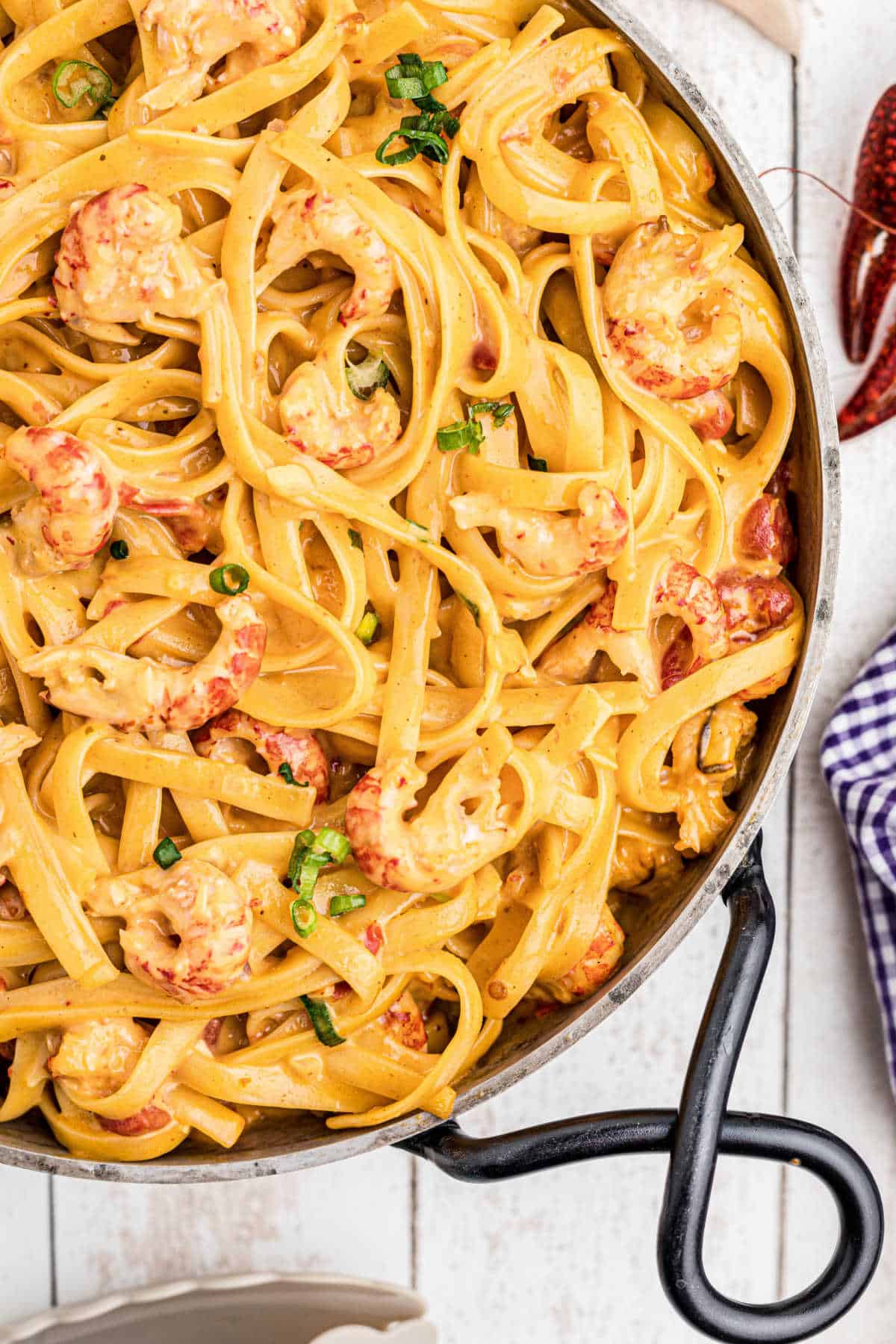 close up of a skillet of crawfish fettuccine