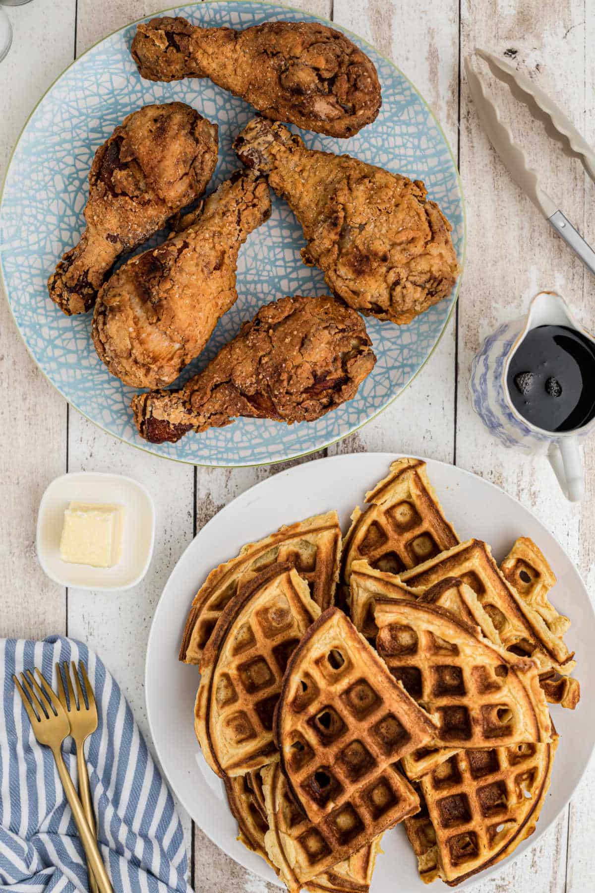 country style chicken and waffles on platters ready to be served