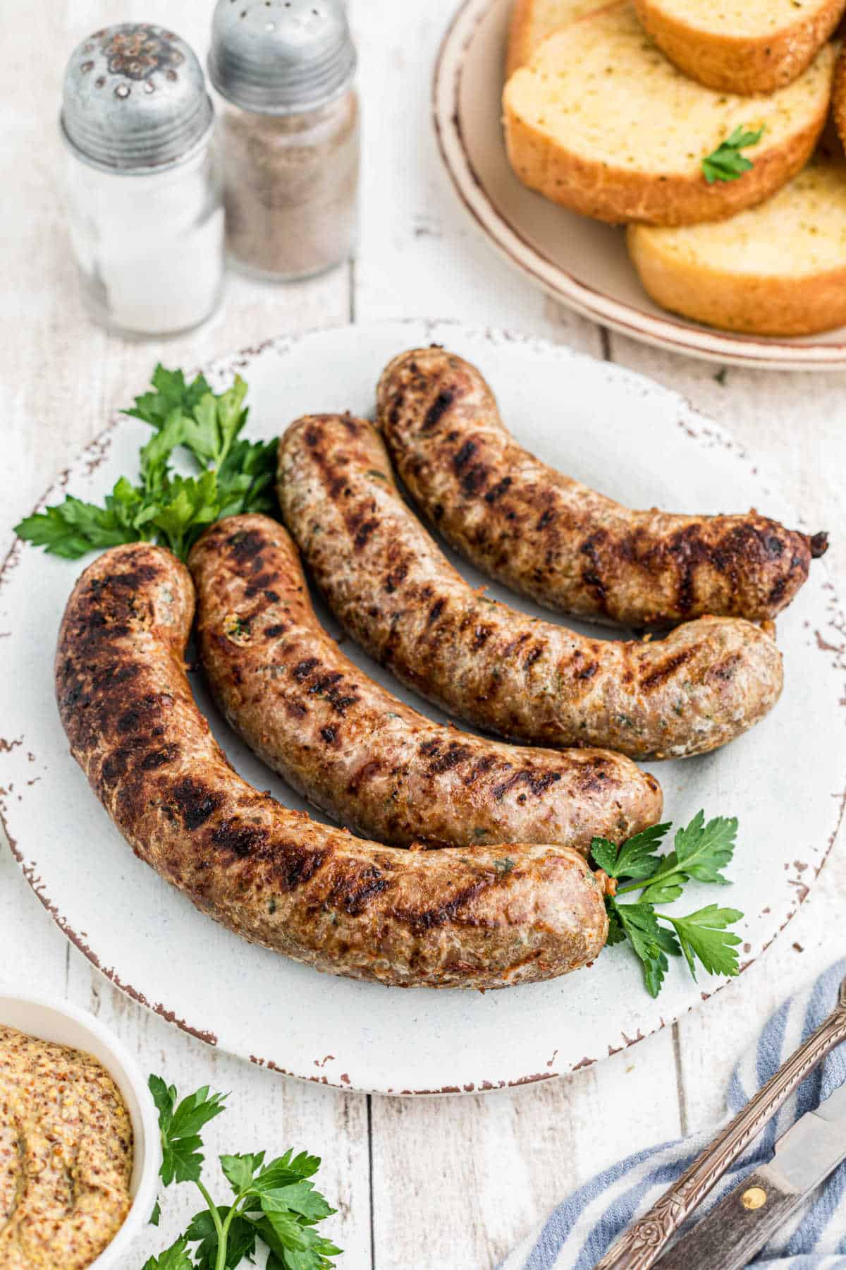 four links of homemade boudin sausage on a plate
