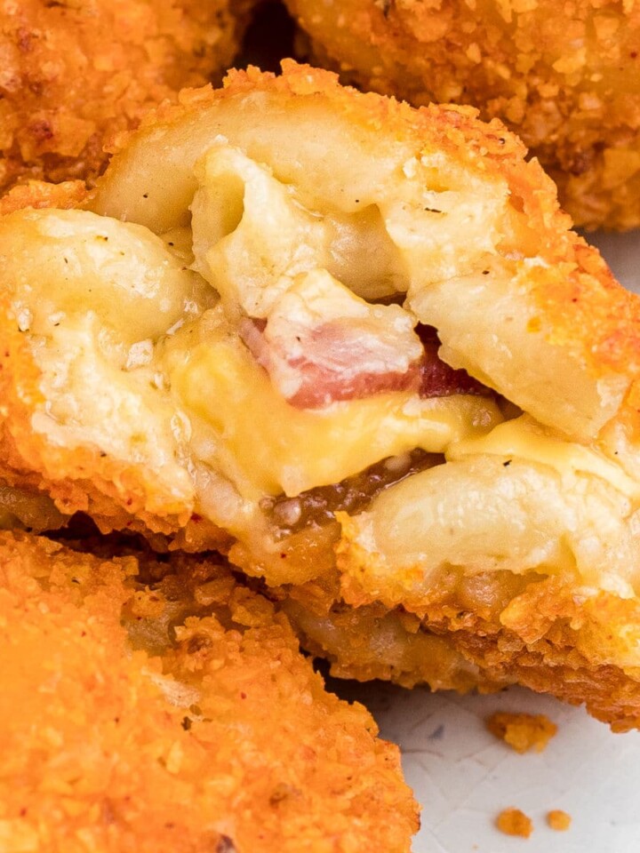 Overhead and close up shot of the inside of a mac and cheese bite.