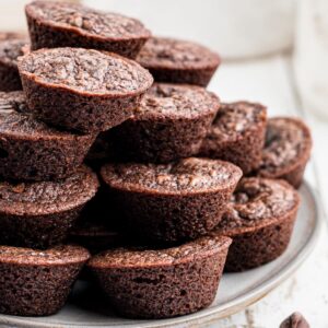 a plate full of brownie bites (mini brownies)