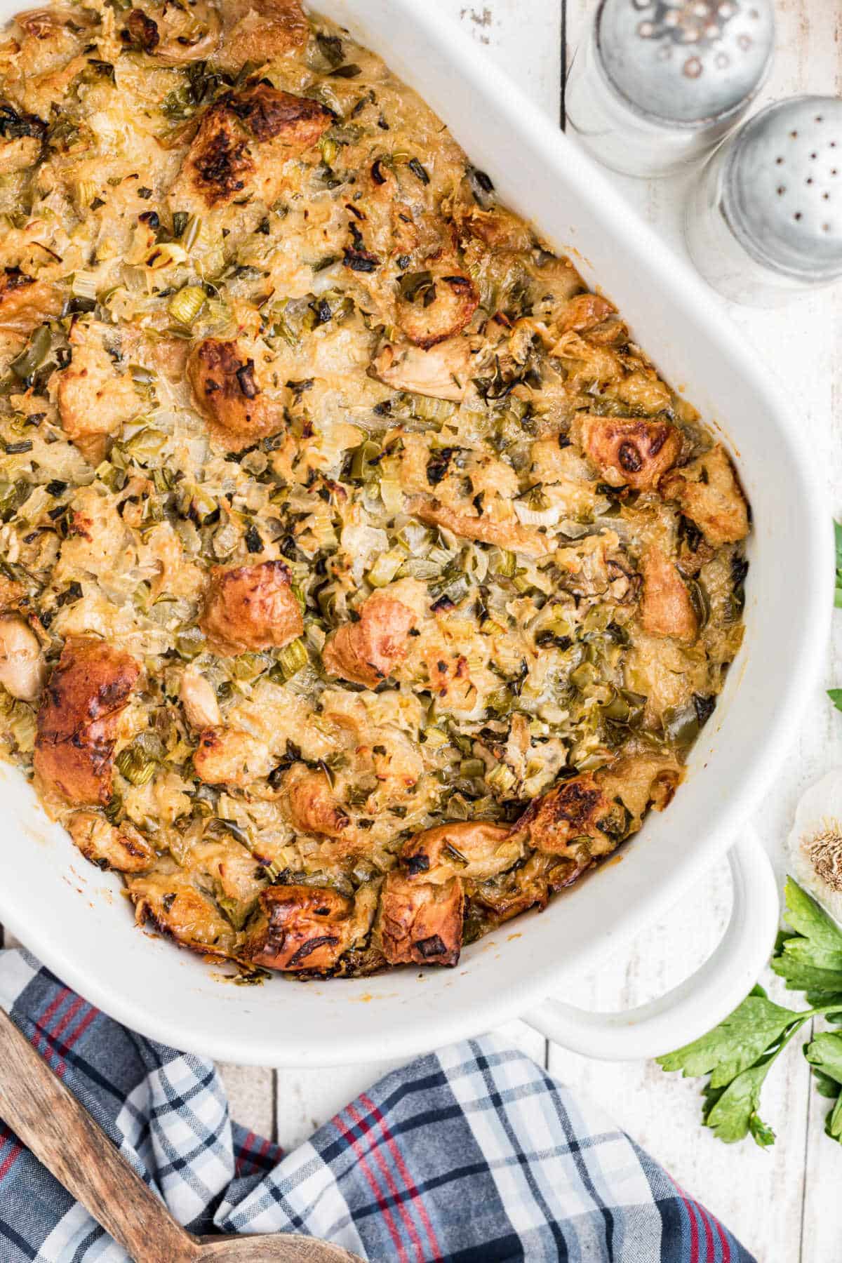 overhead shot of a baked oyster dressing in a casserole dish.