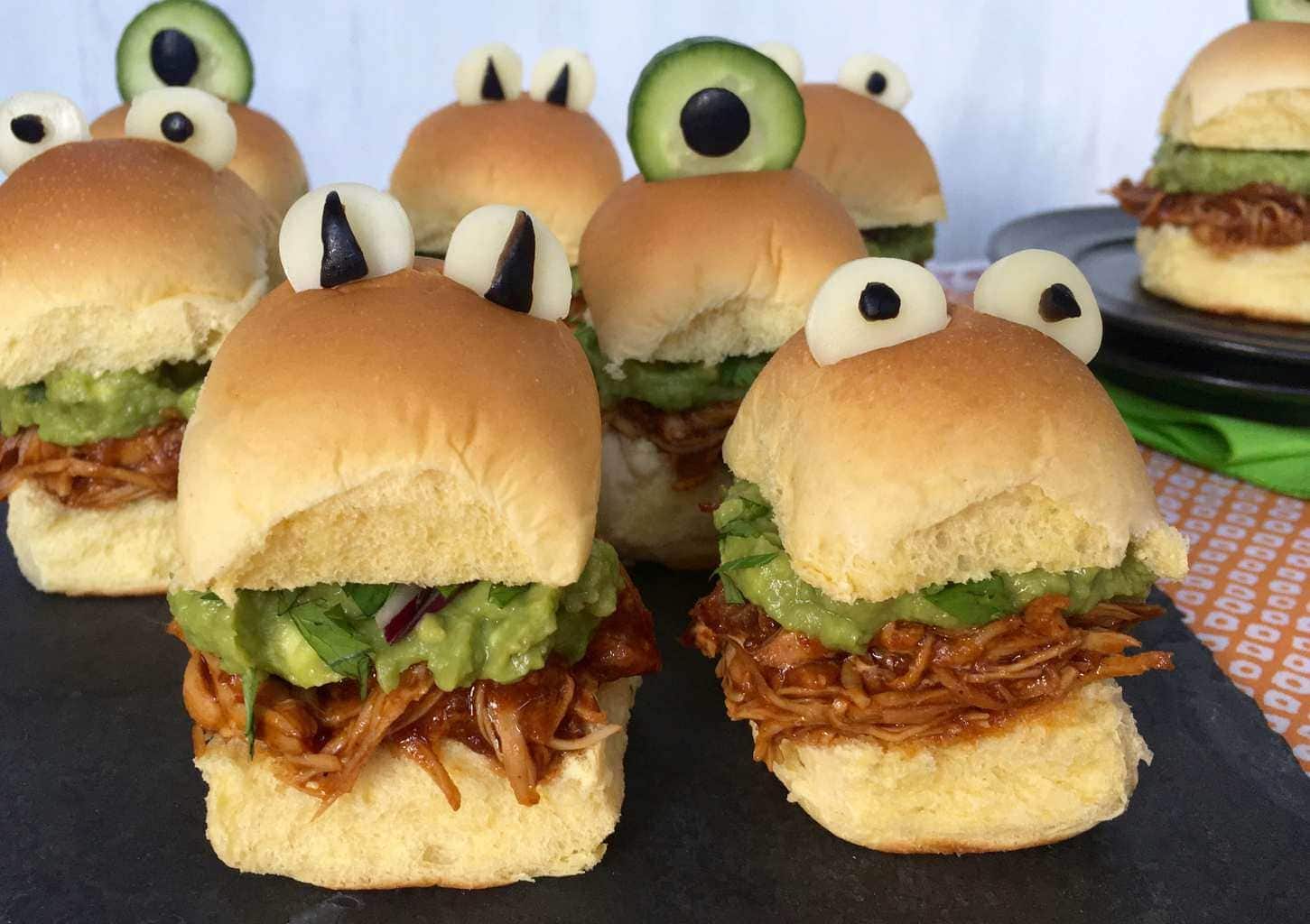 sliders with chicken and some eyeballs made on top