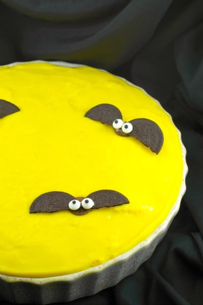 yellow halloween pie with bats on top