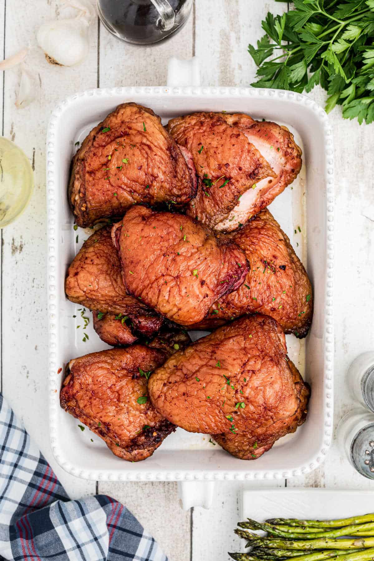 a dish full of smoked chicken thighs