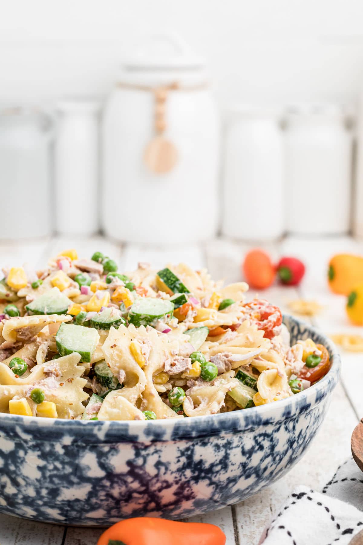 side view of a bowl of tuna pasta salad