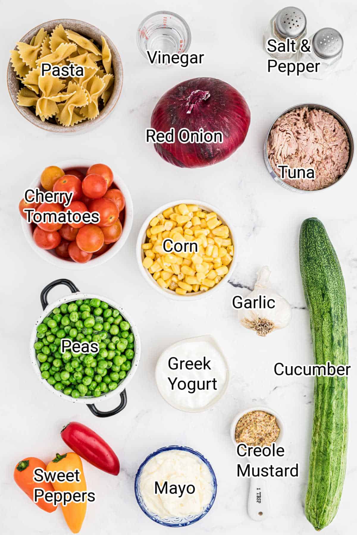 ingredients all laid out to make a tuna pasta salad, an overhead shot