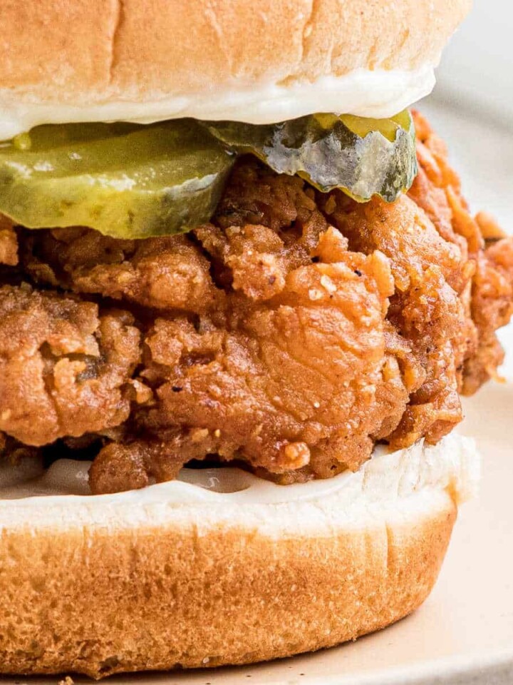 close up shot of a fried chicken sandwich.