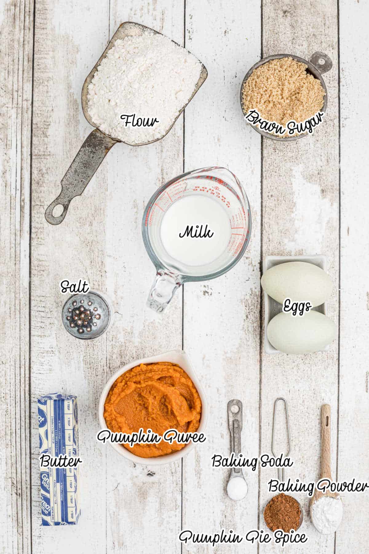 Ingredients laid out showing what is needed to make pumpkin spice donuts.