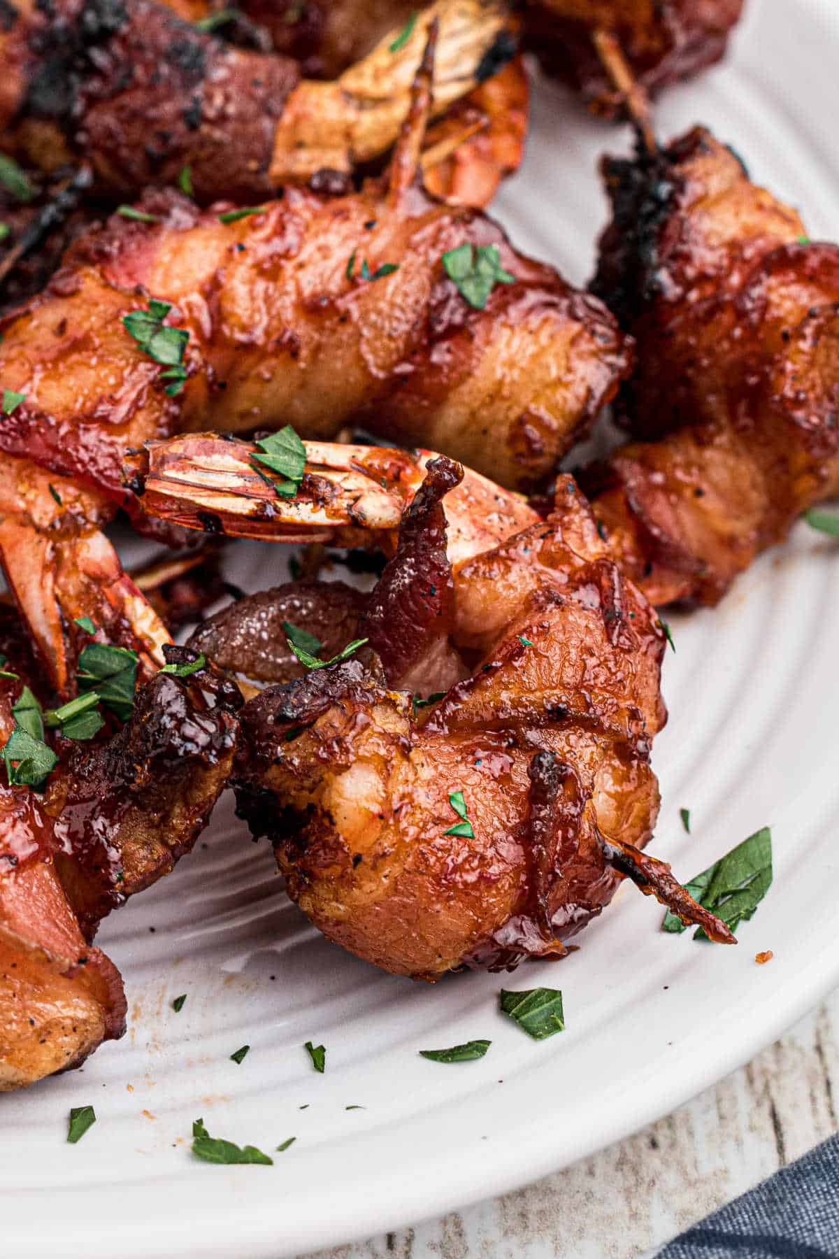 Close up of some bacon wrapped shrimp.