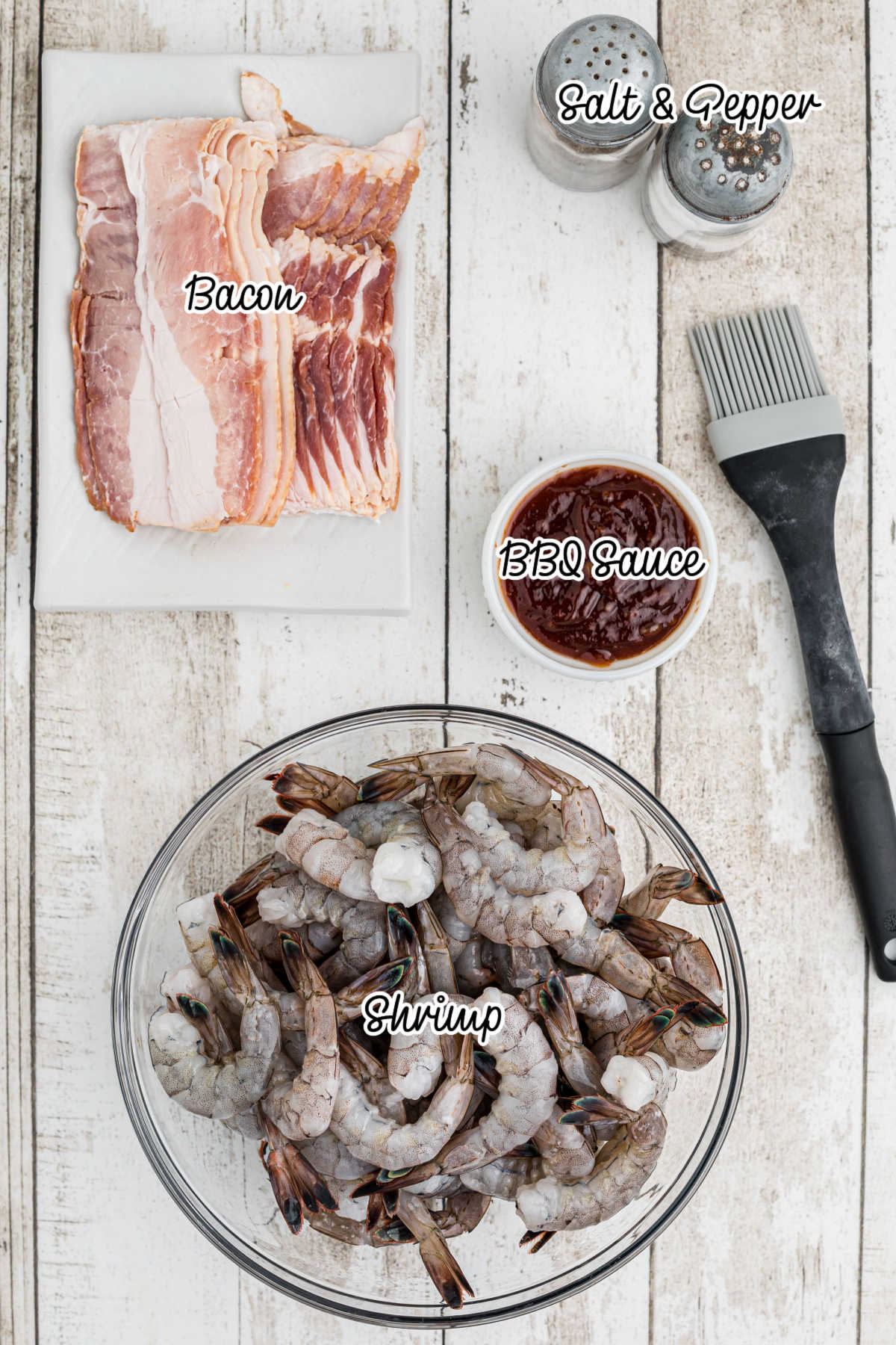 Ingredients needed to make smoked bacon wrapped shrimp.