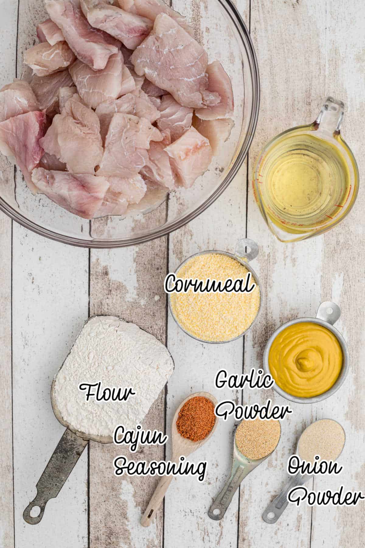 Overhead shot of ingredients needed to make a Cajun fish fry.