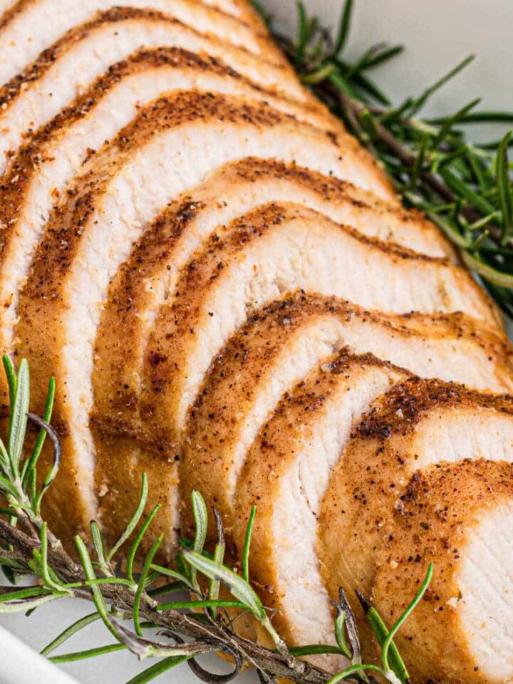 A sliced Cajun Turkey breast laid out sloping toward the camera.