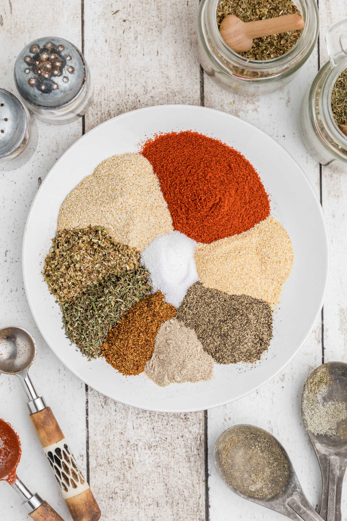 A neatly arranged circle of seasonings.