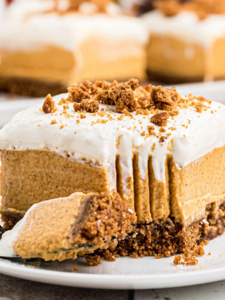 Close up square image of a slice of no bake pumpkin cheesecake.