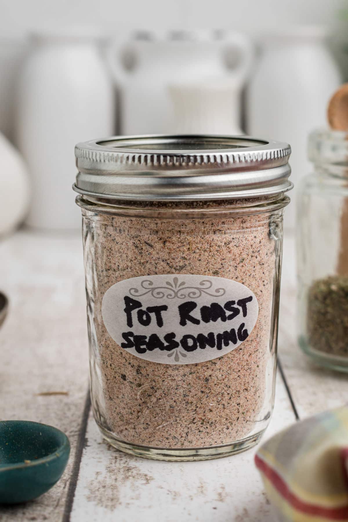 Mason Jar with pot roast seasoning inside, a label saying pot roast seasoning.
