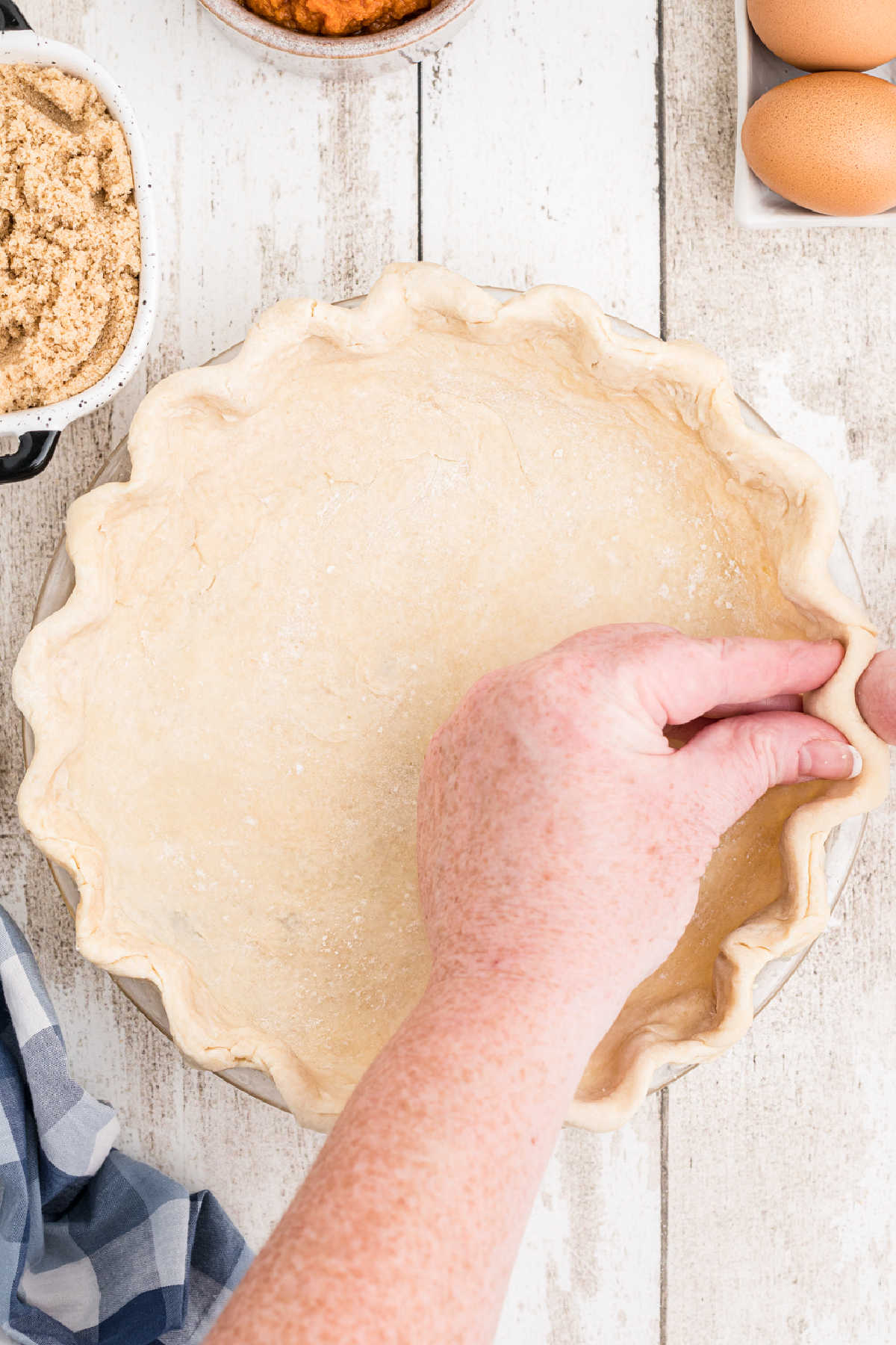 A pie crust having the edges fluted.