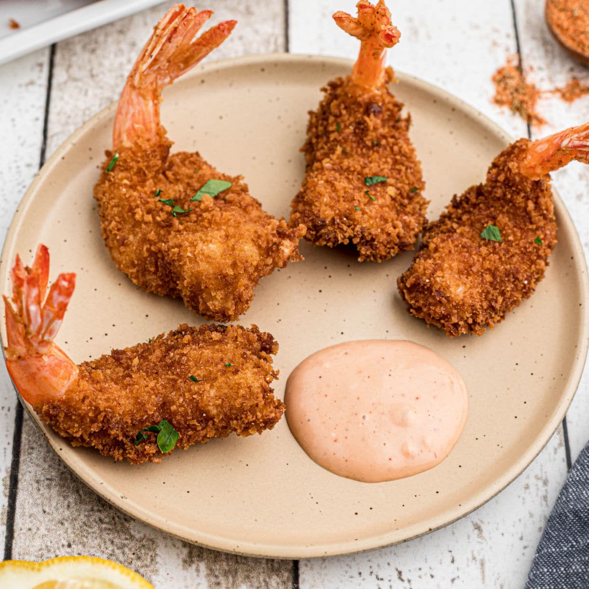 Close up of a plate of butterfly shrimp recipe.