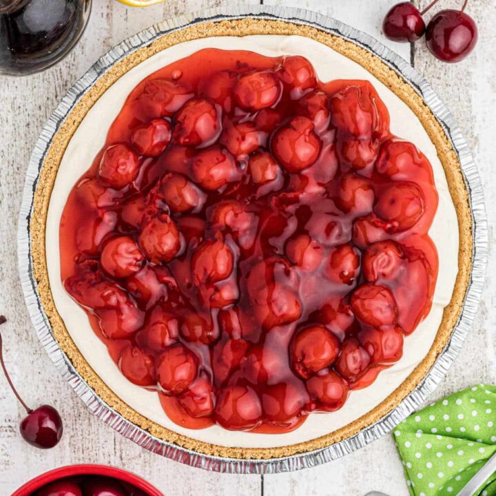 Close up overhead shot of a no bake cherry pie with a graham cracker crust.
