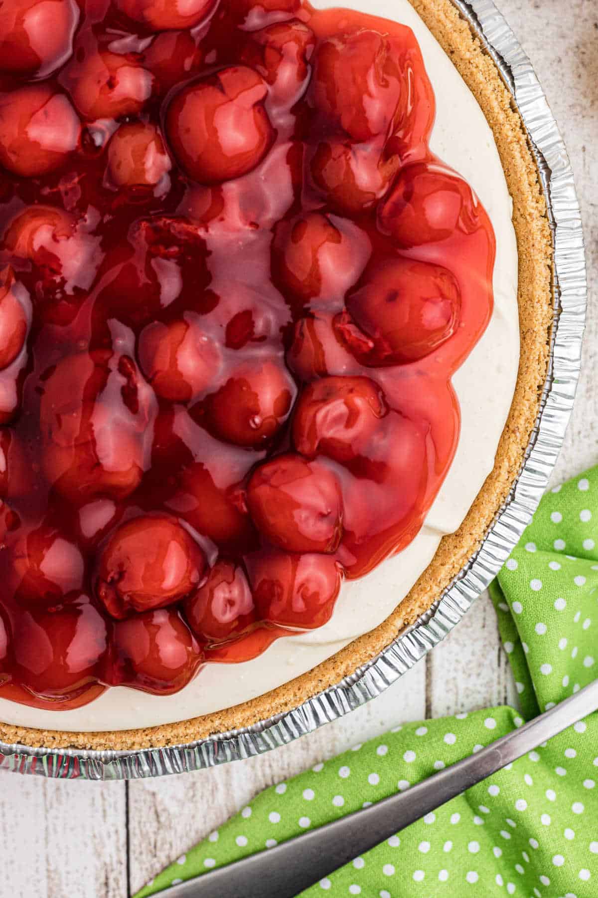 Side shot of a no bake cherry pie.