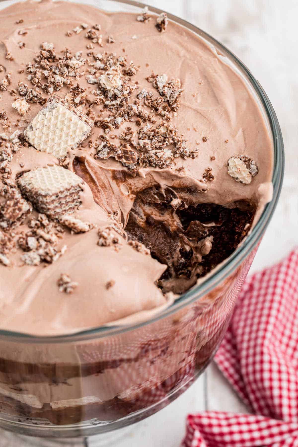 A nutella trifle close up with a scoop taken from it.