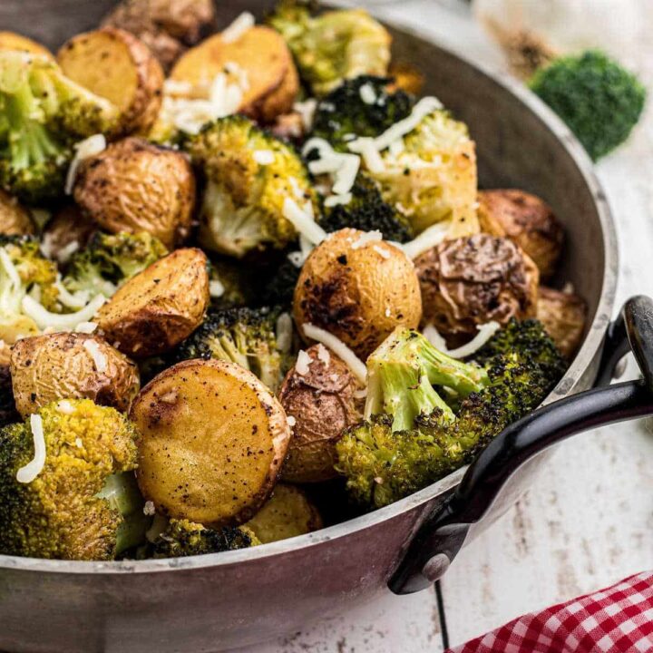 Close up of a pan of roasted potatoes and broccoli.