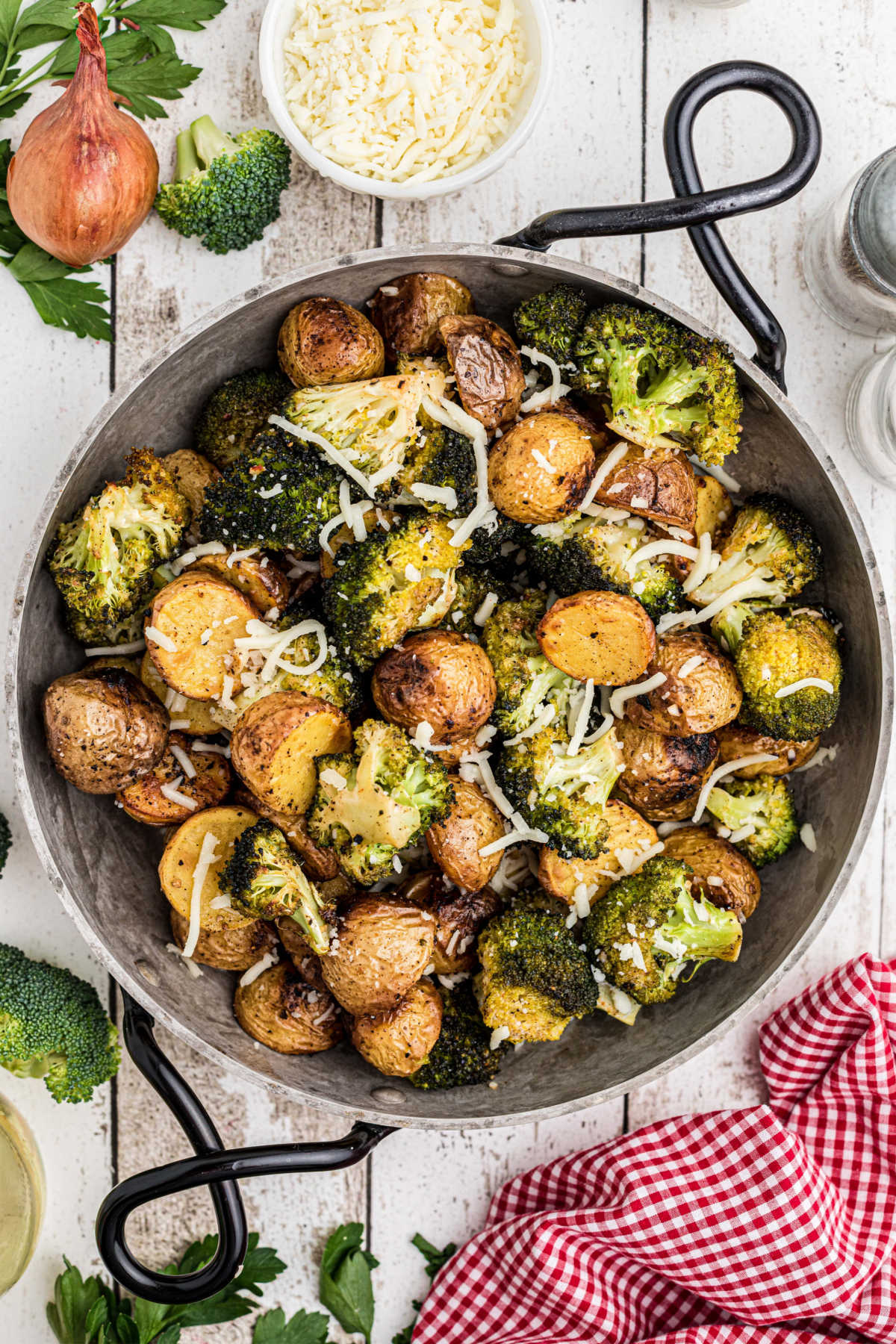 Overhead shot of a pan of roasted potatoes and broccoli.