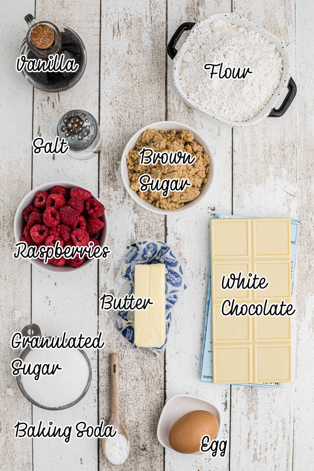 Ingredients needed to make white chocolate raspberry cookies.