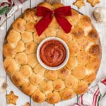 A picture of a pull apart bread wreath cropped square.