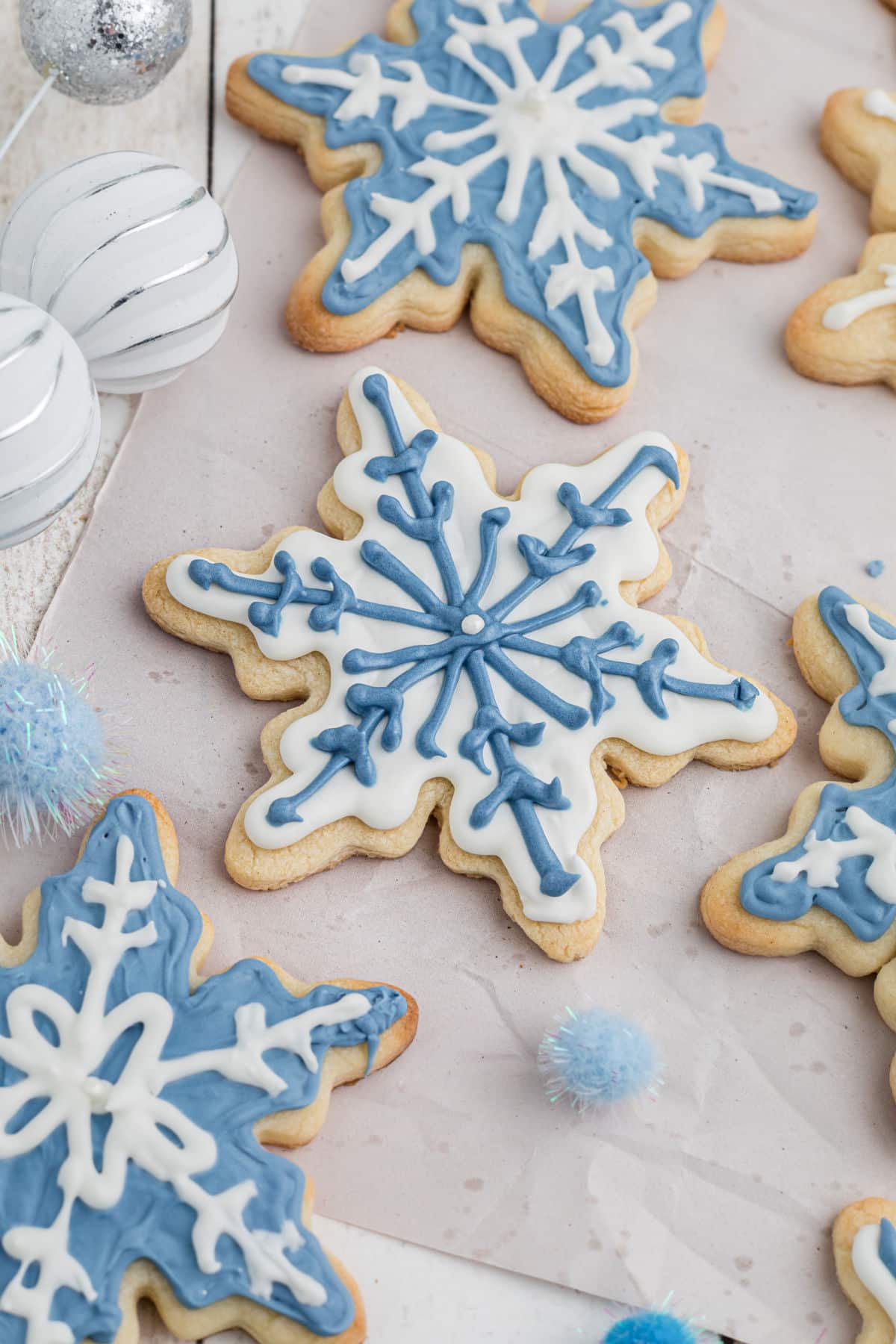 White and blue snowflake cookies.