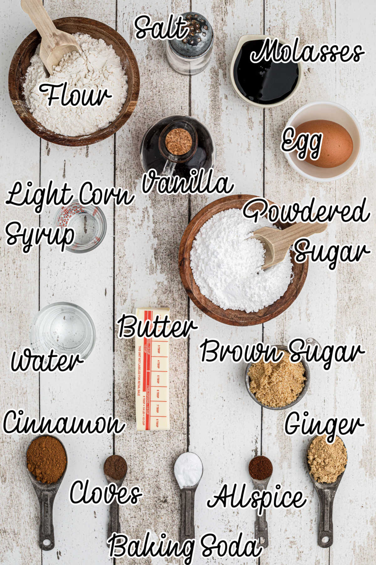 Ingredients laid out, what is needed to make snowflake gingerbread cookies, with text overlay.