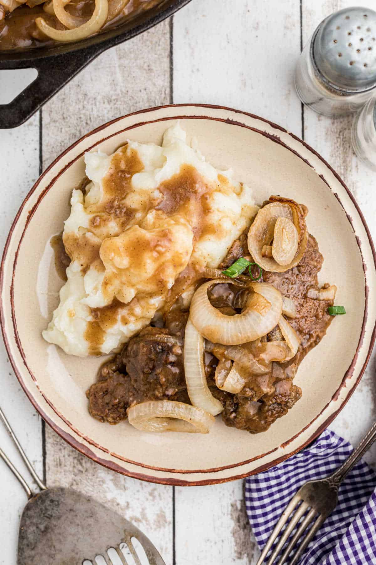 Dished out southern liver and onions with gravy.