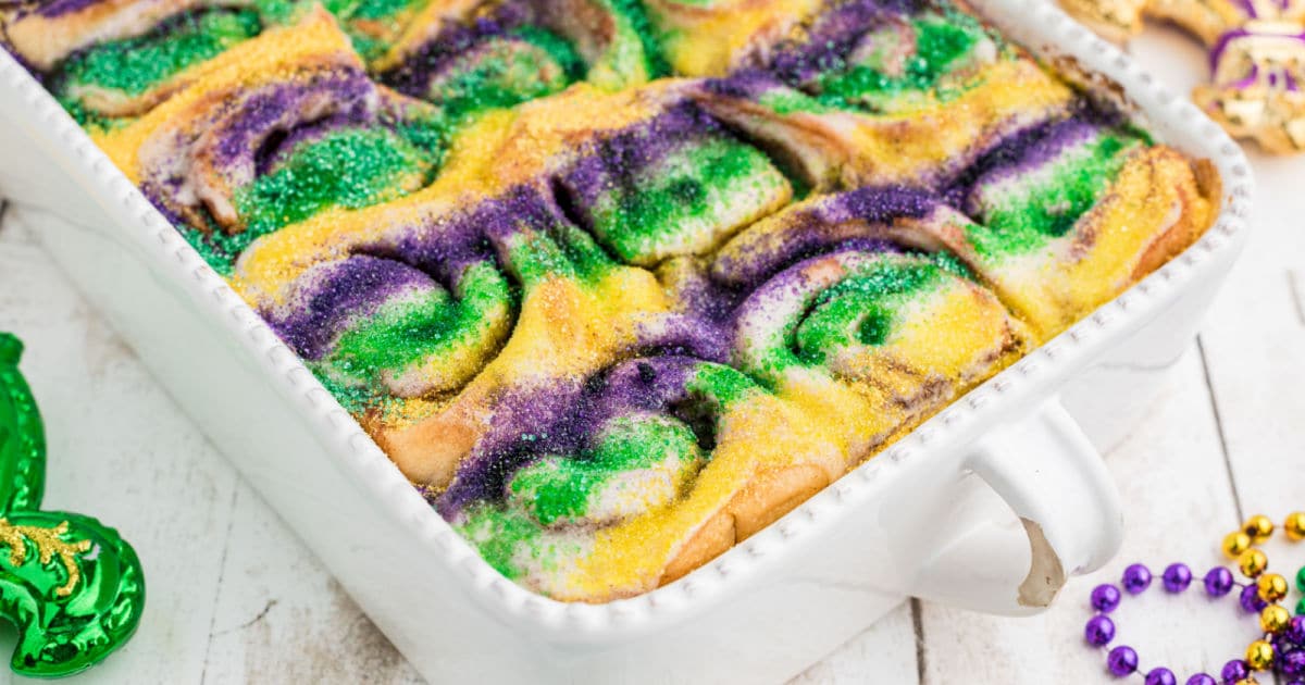 Close up of a dish full of King Cake Cinnamon Rolls.