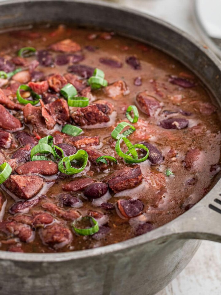 A pot of red beans and rice with ham hocks, cropped square.