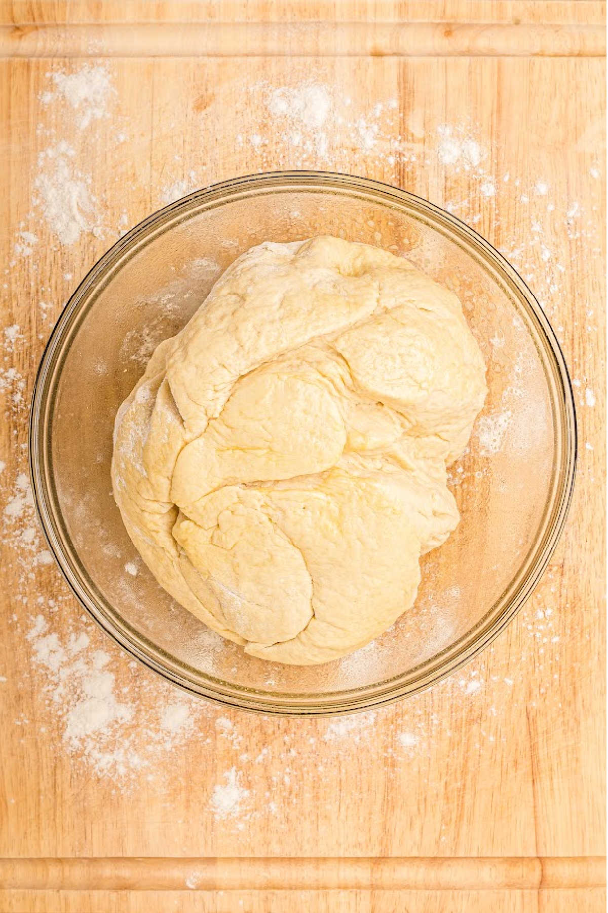 A bowl with dough.